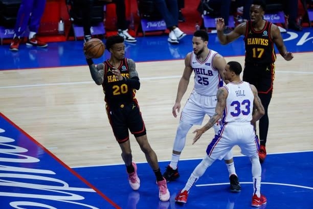 John Collins of the Atlanta Hawks passes during the second quarter against the Philadelphia 76ers during Game Seven of the Eastern Conference...