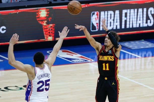 Trae Young of the Atlanta Hawks shoots over Ben Simmons of the Philadelphia 76ers during the fourth quarter during Game Seven of the Eastern...
