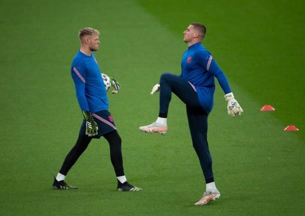 The England reserve goalkeepers Aaron Ramsdale and Sam Johnstone warm up before the UEFA Euro 2020 Championship Group D match between England and...