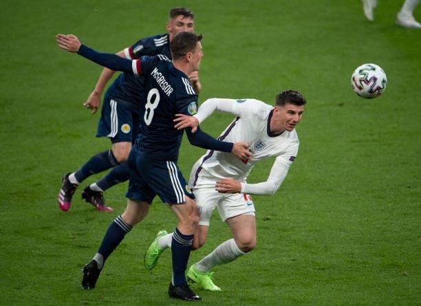 Mason Mount of England in action with Callum McGregor and Billy Gilmour of Scotland in acion during the UEFA Euro 2020 Championship Group D match...