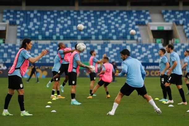 Edinson Cavani and Luis Suarez of Uruguay warm up before a group A match between Uruguay and Chile as part of Conmebol Copa America Brazil 2021 at...