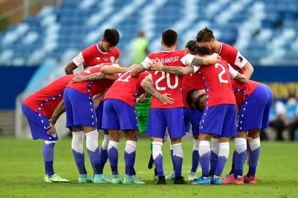 Players of Chile huddle before a group A match between Uruguay and Chile as part of Conmebol Copa America Brazil 2021 at Arena Pantanal on June 21,...