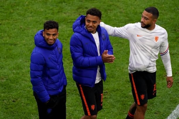 Owen Wijndal of the Netherlands, Donyell Malen of the Netherlands and Memphis Depay of the Netherlands during the UEFA Euro 2020 Championship Group C...