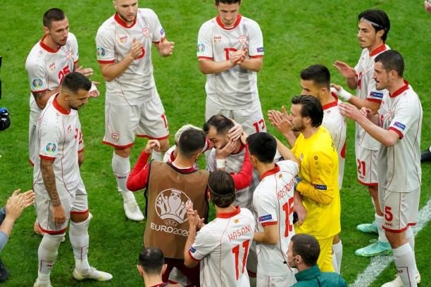 Players of North Macedonia form a guard of honour for Goran Pandev of North Macedonia during the UEFA Euro 2020 Championship Group C match between...