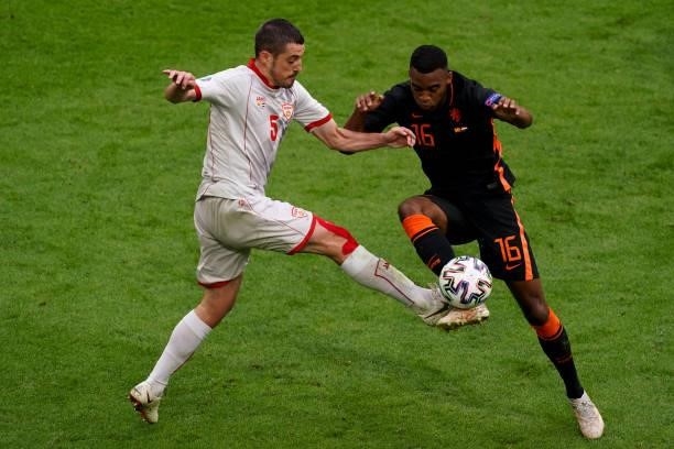 Arijan Ademi of North Macedonia and Ryan Gravenberch of the Netherlands during the UEFA Euro 2020 Championship Group C match between North Macedonia...