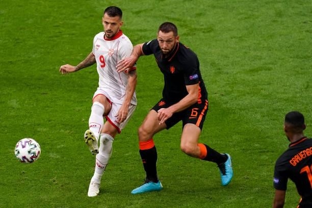 Aleksandar Trajkovski of North Macedonia and Stefan de Vrij of the Netherlands during the UEFA Euro 2020 Championship Group C match between North...