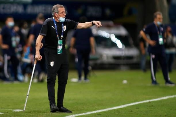 Head coach of Uruguay Oscar Tabarez gives instructions to his players during a group A match between Uruguay and Chile as part of Conmebol Copa...