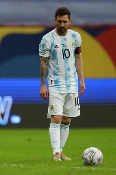 Lionel Messi of Argentina prepares to take a free kick during a group A match between Argentina and Paraguay as part of Conmebol Copa America Brazil...