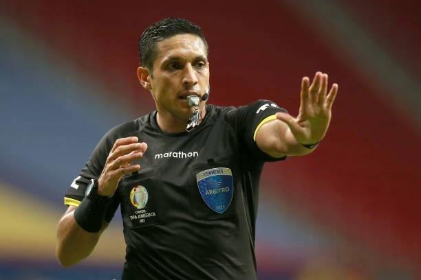 Referee Jesús Valenzuela gestures during a group A match between Argentina and Paraguay as part of Conmebol Copa America Brazil 2021 at Mane...