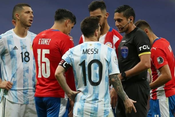 Lionel Messi of Argentina argues with referee Jesús Valenzuela during a group A match between Argentina and Paraguay as part of Conmebol Copa America...