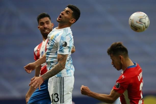 Cristian Romero of Argentina heads the ball during a group A match between Argentina and Paraguay as part of Conmebol Copa America Brazil 2021 at...