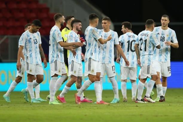 Lionel Messi of Argentina celebrates with teammates after winning a group A match between Argentina and Paraguay as part of Conmebol Copa America...