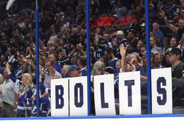 Tampa Bay Lightning fans celebrate against the New York Islanders during the third period in Game Five of the Stanley Cup Semifinals during the 2021...