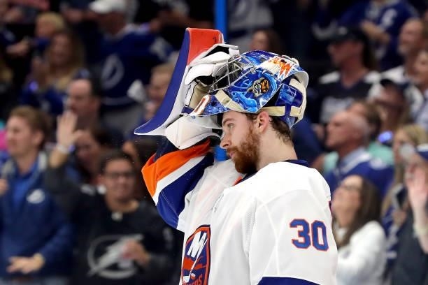 Ilya Sorokin of the New York Islanders reacts after allowing a goal to Luke Schenn of the Tampa Bay Lightning during the third period in Game Five of...