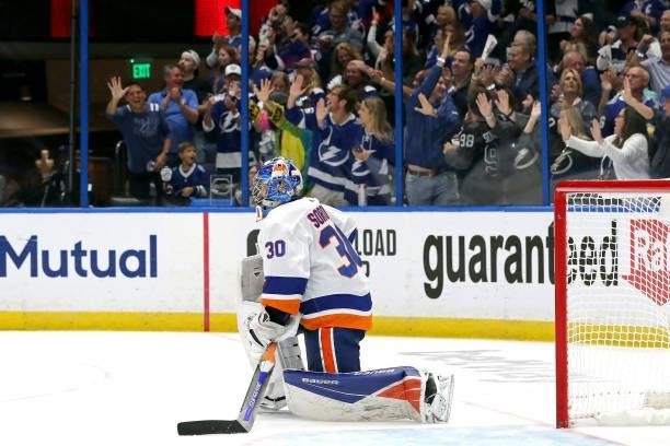 Ilya Sorokin of the New York Islanders reacts after allowing a goal to Luke Schenn of the Tampa Bay Lightning during the third period in Game Five of...