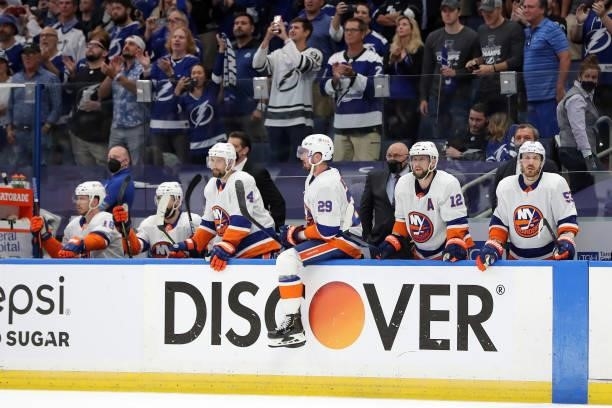 The New York Islanders react to their 8-0 defeat to the Tampa Bay Lightning in Game Five of the Stanley Cup Semifinals during the 2021 Stanley Cup...