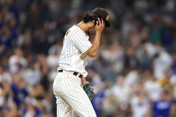 Yu Darvish of the San Diego Padres looks on after allowing a solo homerun to Mookie Betts of the Los Angeles Dodgers during the third inning of a...