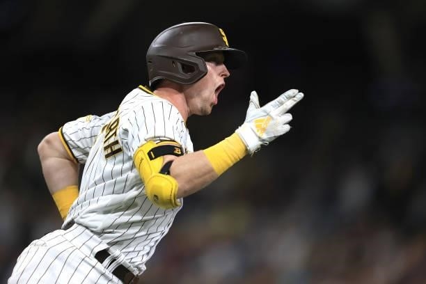 Jake Cronenworth of the San Diego Padres reacts after hitting a two-run homerun during the fifth inning of a game against the Los Angeles Dodgers at...