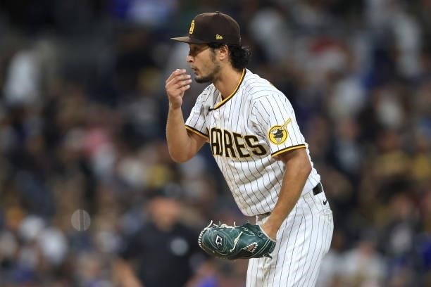 Yu Darvish of the San Diego Padres looks on after recording his 1500th strikeout during the sixth inning of a game against the Los Angeles Dodgers at...