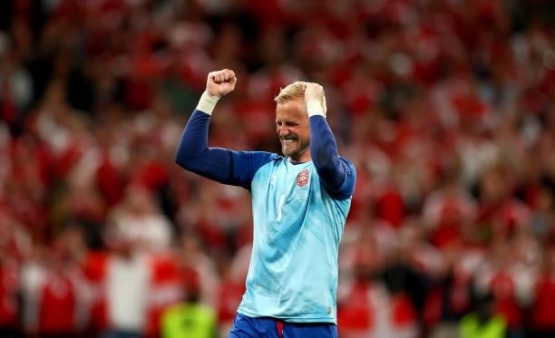 Kasper Schmeichel of Denmark celebrates following their side's victory in during the UEFA Euro 2020 Championship Group B match between Russia and...