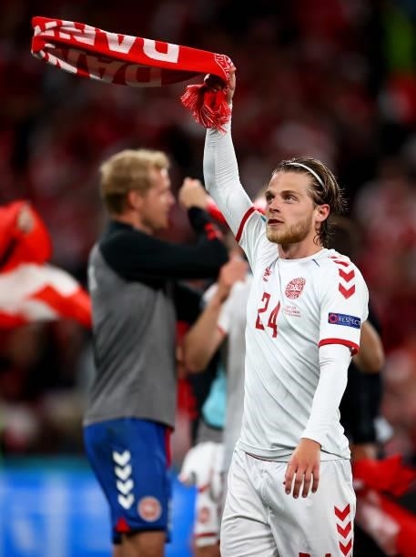 Mathias Jensen of Denmark celebrates following their side's victory in during the UEFA Euro 2020 Championship Group B match between Russia and...