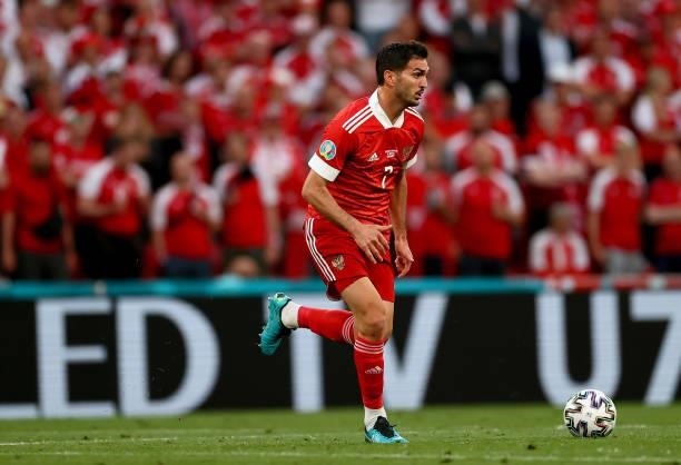 Magomed Ozdoev of Russia runs with the ball during the UEFA Euro 2020 Championship Group B match between Russia and Denmark at Parken Stadium on June...