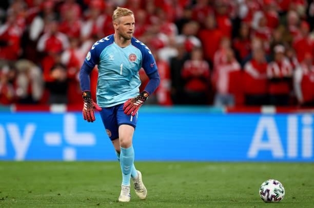 Kasper Schmeichel of Denmark controls the ball during the UEFA Euro 2020 Championship Group B match between Russia and Denmark at Parken Stadium on...