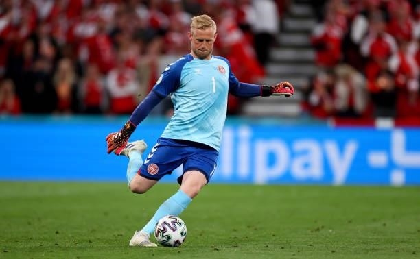 Kasper Schmeichel of Denmark controls the ball during the UEFA Euro 2020 Championship Group B match between Russia and Denmark at Parken Stadium on...
