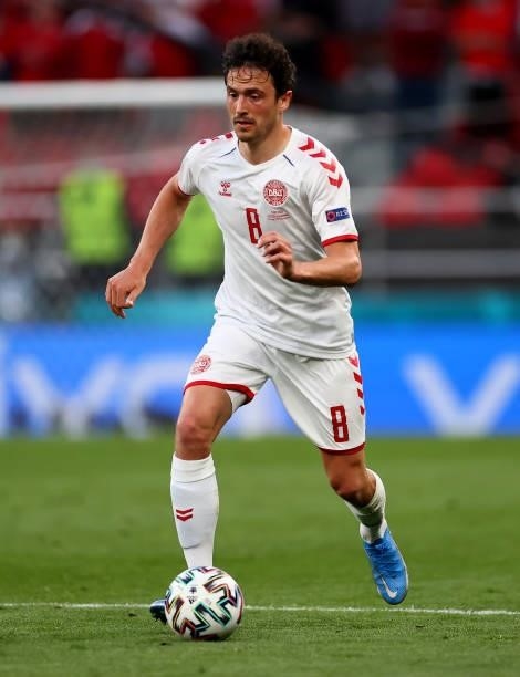 Thomas Delaney of Denmark runs with the ball during the UEFA Euro 2020 Championship Group B match between Russia and Denmark at Parken Stadium on...