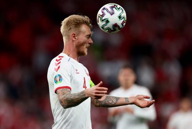 Simon Kjær of Denmark challenges head's the ball during the UEFA Euro 2020 Championship Group B match between Russia and Denmark at Parken Stadium on...