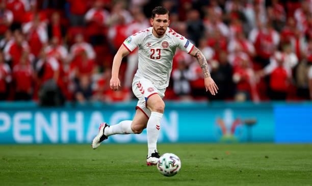Pierre-Emile Højbjerg of Denmark runs with the ball during the UEFA Euro 2020 Championship Group B match between Russia and Denmark at Parken Stadium...