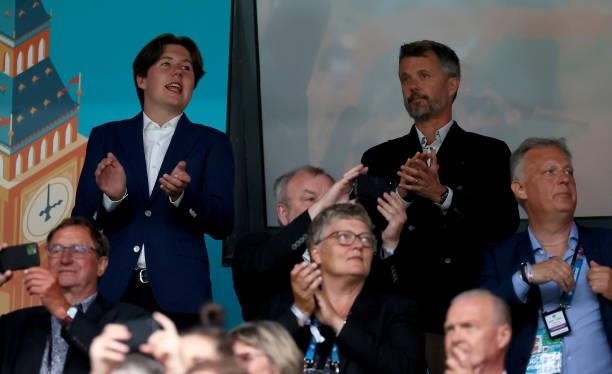 Frederik , Crown Prince of Denmark applauds with his Son, Prince Christian of Denmark during the UEFA Euro 2020 Championship Group B match between...