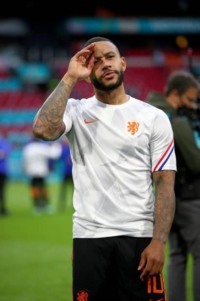 Memphis Depay of Netherlands salutes his friends and family after the match during the UEFA Euro 2020 Championship Group C match between North...