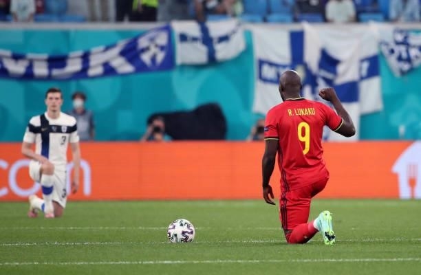 Romelu Lukaku of Belgium kneels in respect for Black Lives Matter movement during the UEFA Euro 2020 Championship Group B match between Finland and...