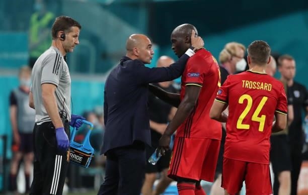 Romelu Lukaku of Belgium celebrates with Roberto Martinez, head coach of Belgium, after scoring a canceled goal during the UEFA Euro 2020...