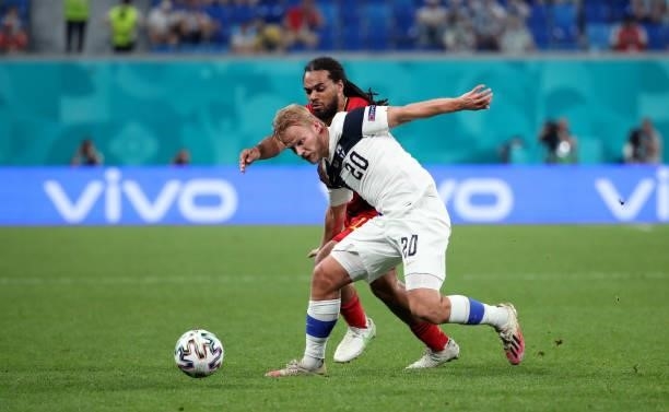 Jason Denayer of Belgium battles for the ball with Joel Pohjanpalo of Finland during the UEFA Euro 2020 Championship Group B match between Finland...