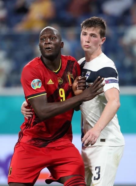 Romelu Lukaku of Belgium in action with Daniel O'Shaughnessy of Finland during the UEFA Euro 2020 Championship Group B match between Finland and...