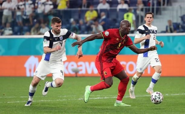 Romelu Lukaku of Belgium battles for the ball with Joona Toivio of Finland during the UEFA Euro 2020 Championship Group B match between Finland and...