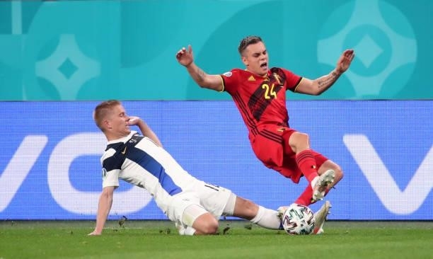 Leandro Trossard of Belgium battles for the ball with Jere Uronen of Finland during the UEFA Euro 2020 Championship Group B match between Finland and...