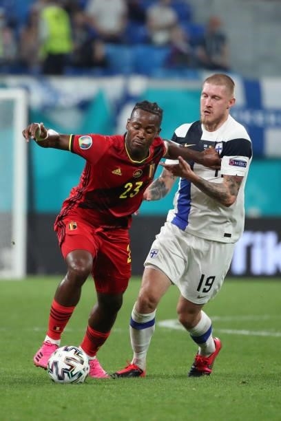 Michy Batshuayi of Belgium battles for the ball with Joni Kauko of Finland during the UEFA Euro 2020 Championship Group B match between Finland and...