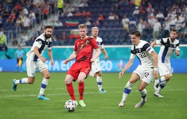 Kevin De Bruyne of Belgium battles for the ball with Jukka Raitala of Finland during the UEFA Euro 2020 Championship Group B match between Finland...