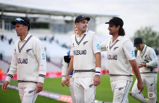Tim Southee and Colin De Grandhomme of New Zealand walk off at the end of play on Day 5 of the ICC World Test Championship Final between India and...