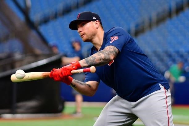 Christian Vazquez of the Boston Red Sox warms up before a game against the Tampa Bay Rays at Tropicana Field on June 22, 2021 in St Petersburg,...