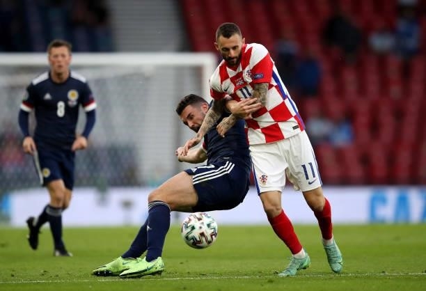 John McGinn of Scotland battles with Marcelo Brozovic of Croatia during the UEFA Euro 2020 Championship Group D match between Croatia and Scotland at...