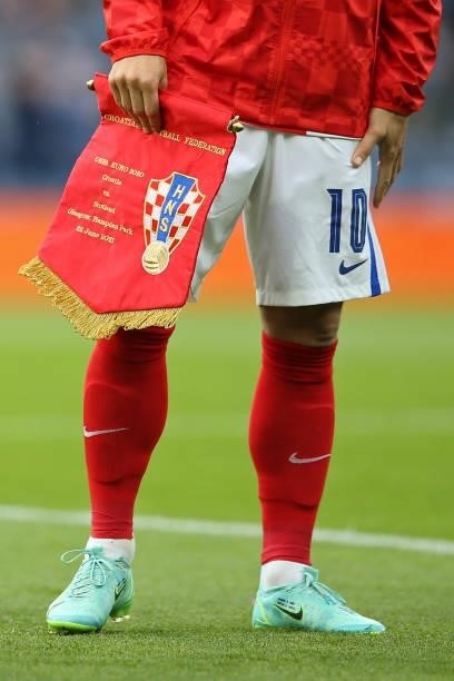 Luka Modric of Croatia holds a match pennant during the UEFA Euro 2020 Championship Group D match between Croatia and Scotland at Hampden Park on...