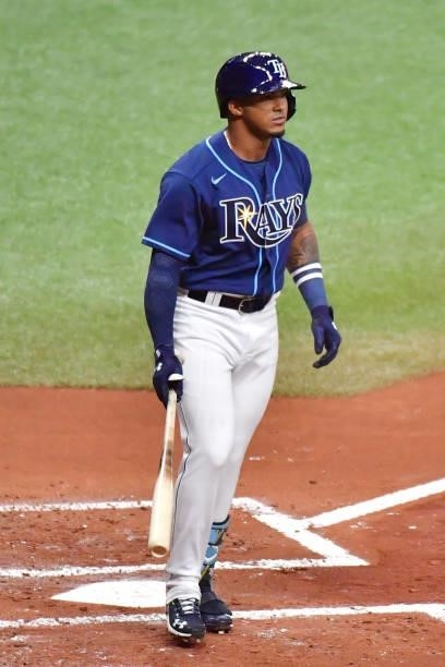 Wander Franco of the Tampa Bay Rays reacts after being walked in his Major League debut during the first inning against the Boston Red Sox at...