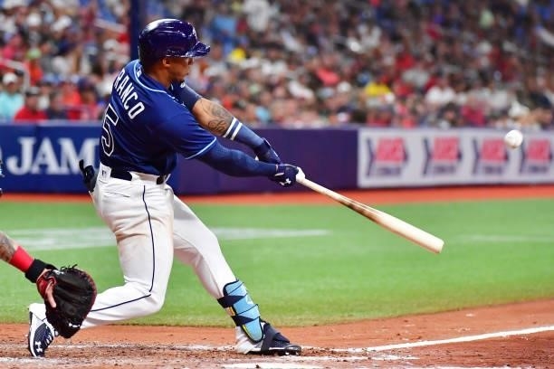 Wander Franco of the Tampa Bay Rays hits a three-run home run during his Major League debut in the fifth inning against the Boston Red Sox at...
