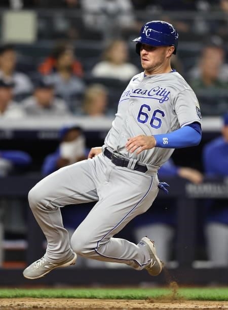 Ryan O'Hearn of the Kansas City Royals slides home safely in the eighth inning against the New York Yankees at Yankee Stadium on June 22, 2021 in the...