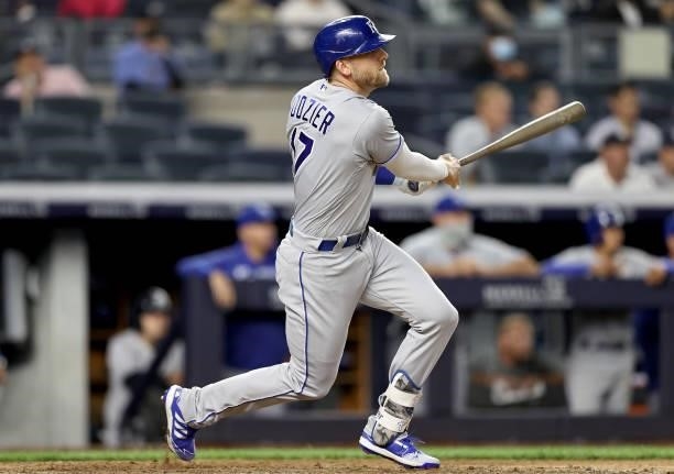 Hunter Dozier of the Kansas City Royals hits an RBI single in the eighth inning against the New York Yankees at Yankee Stadium on June 22, 2021 in...