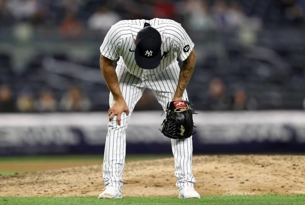 Jonathan Loaisiga of the New York Yankees reacts in the eight inning against the Kansas City Royals at Yankee Stadium on June 22, 2021 in the Bronx...